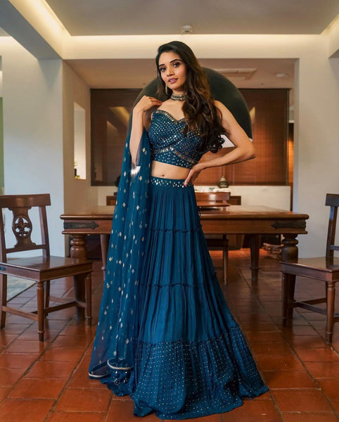 Exquisite Faux Georgette Lehenga Choli with Heavy Embroidery