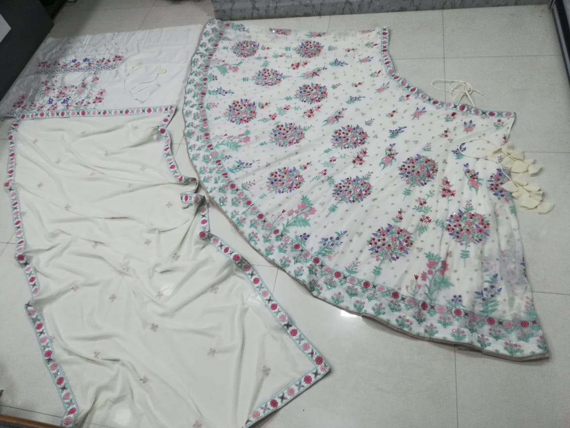 Exquisite Cream Georgette Lehenga Choli with Multi Thread Embroidery