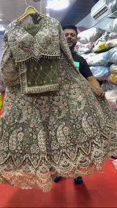 Latest Green Color Net Sequence Lehenga Choli