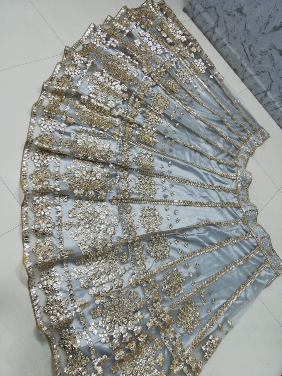 Elegant Gray Net Lehenga Choli with Mirror Jari Embroidery