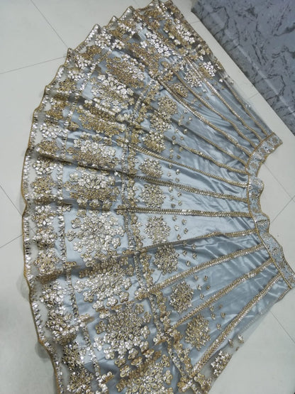 Elegant Gray Net Lehenga Choli with Mirror Jari Embroidery