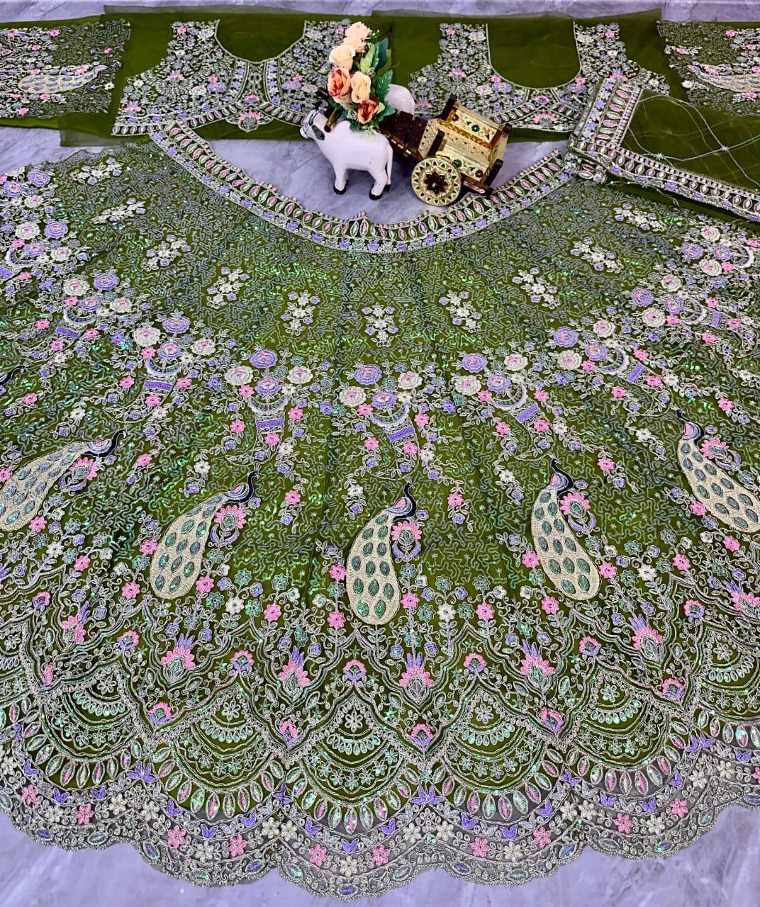 Latest Green Color Net Sequence Lehenga Choli