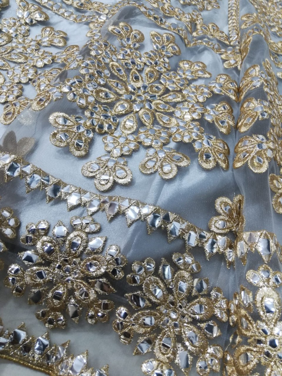 Elegant Gray Net Lehenga Choli with Mirror Jari Embroidery