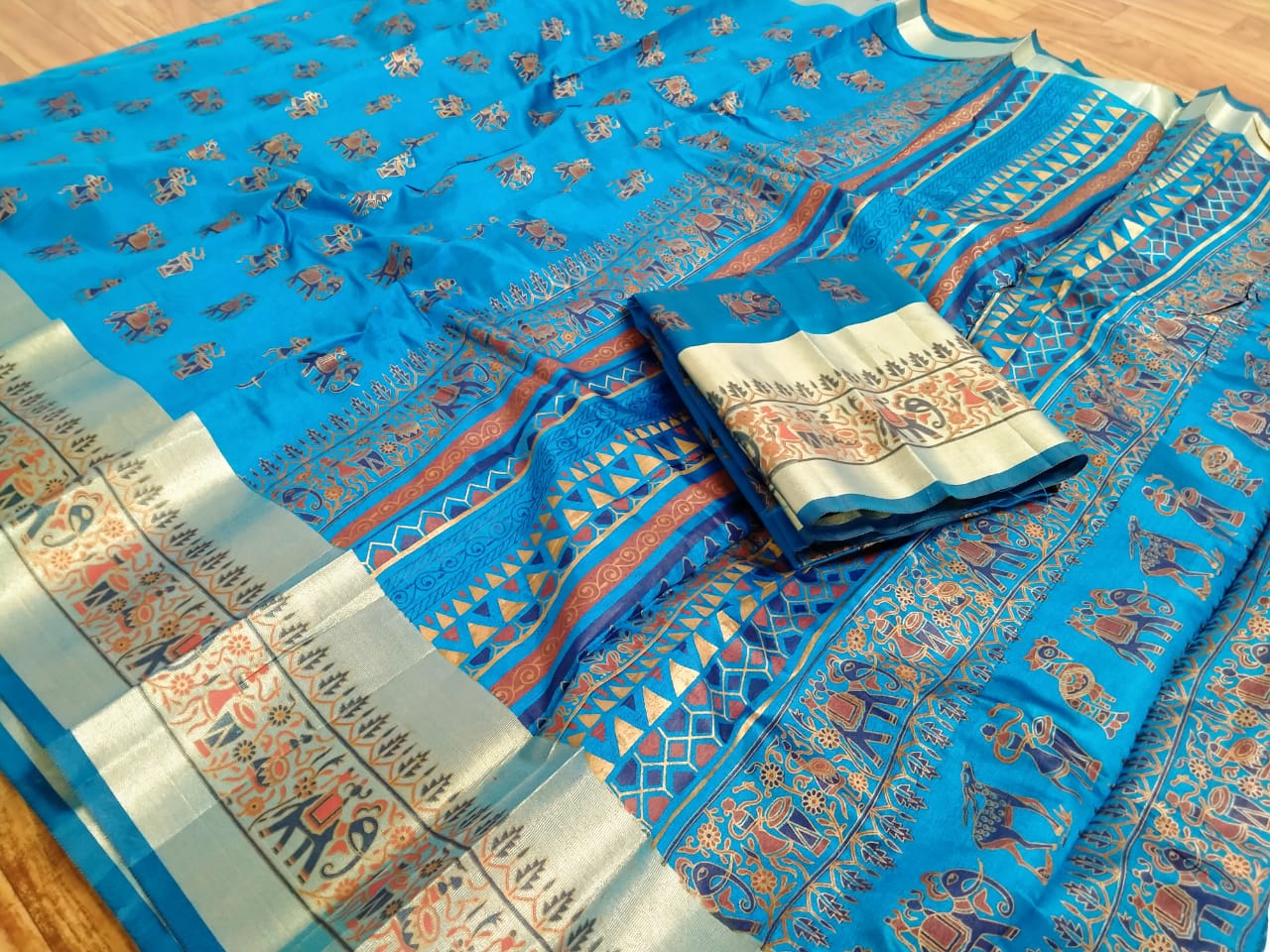 Alluring Firozi Poly Silk With Hand Foil Print Designer Fancy Saree Online