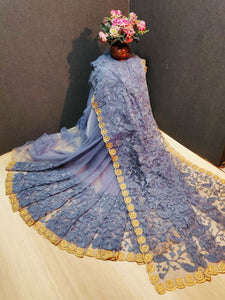 Magnificent Light Blue Net With Golden Zari Hand Work fancy designer saree