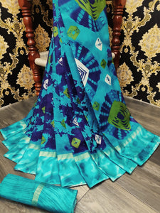 Captivating Sky Blue Cotton Batik Printed Satin Patta fancy designer saree