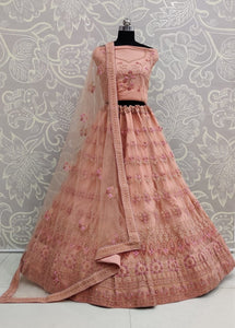 Tangerine Color Bridal Wear Multi Thread Embroidered Net Lehenga Choli