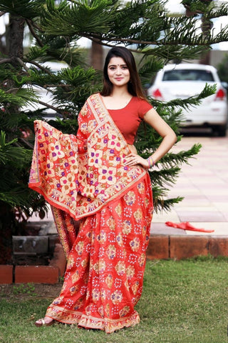 Dazzling Dark Orange Silk Bandhani Zari Weaving fancy designer saree