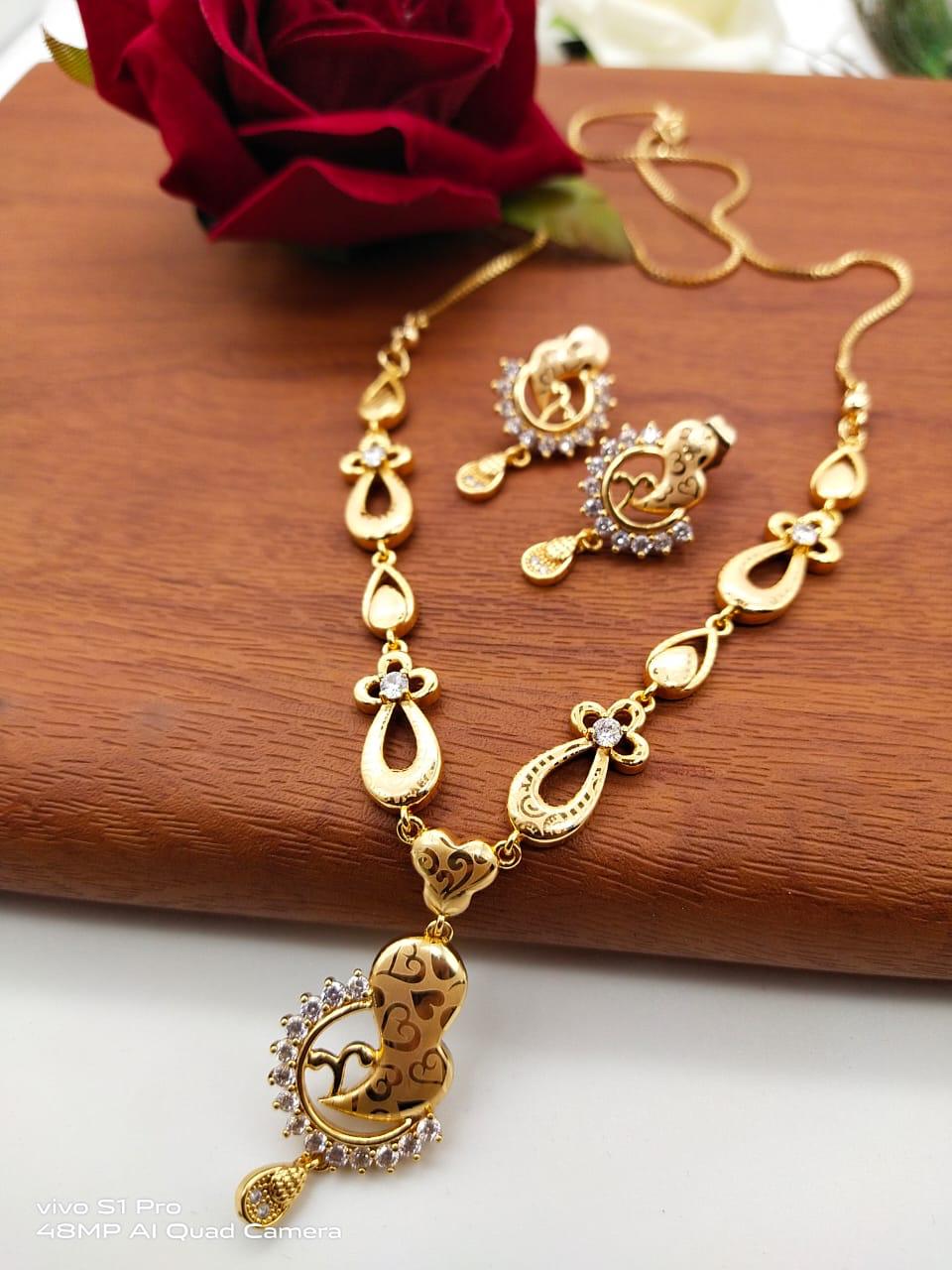 Fabulous White Diamond Golden Artificial Necklace Set Design