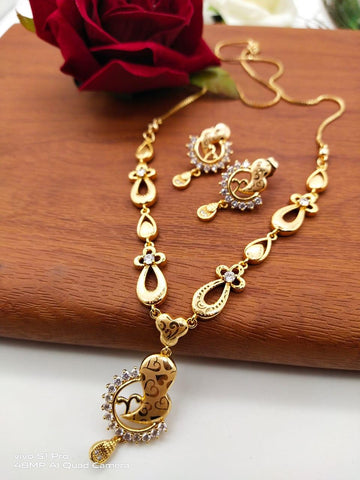 Fabulous White Diamond Golden Artificial Necklace Set Design