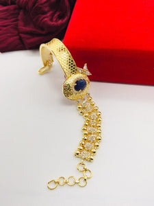 Tremendous Blue American Diamond Golden Artificial Bracelet