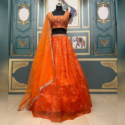 Appealing Orange Color Organza Digital Printed Embroidered Work Lehenga Choli