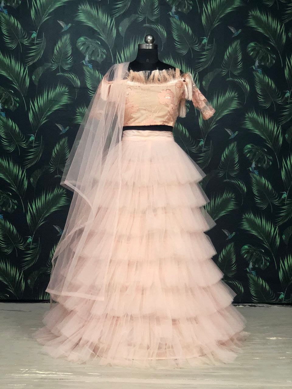 Striking Peach Color Function Wear Soft Net Embroidered Work Lehenga Choli