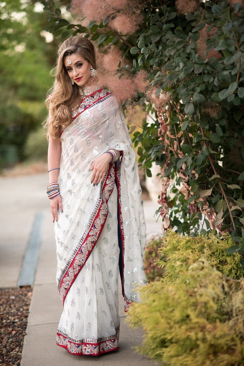 Dashing White Color Fancy Latest Georgette Multi Thread Work Saree For Function Wear