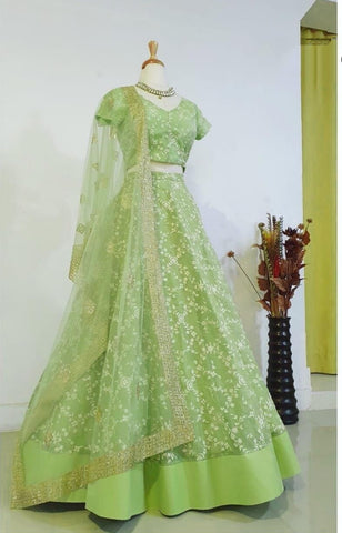 Sophisticated Light Green Color Festive Wear Net Thread Embroidered Work Designer Lehenga Choli