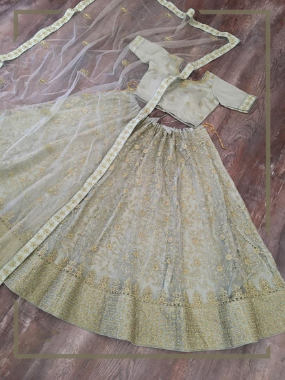 Graceful Light Green Color Traditional Wear Soft Net Designer Glitter Zari Embroidered Work Lehenga CholI