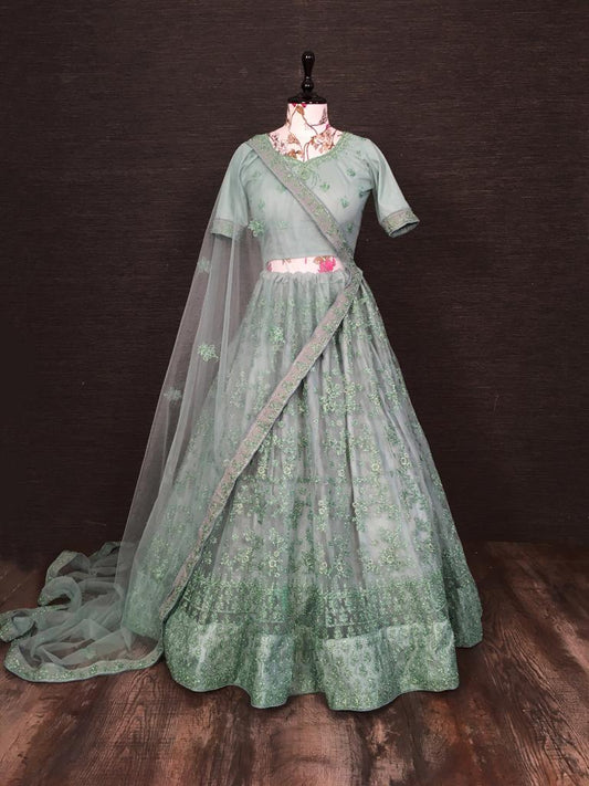 Sensational Green Color Dashing Soft Net Zari Glitter Embroidered Work Occasion Wear Lehenga Choli