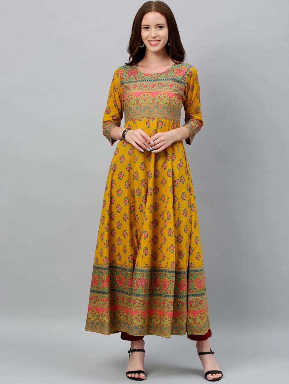 Impressive Mustard Color Party Wear Rayon Jazzy Printed Design Ready Made Gown