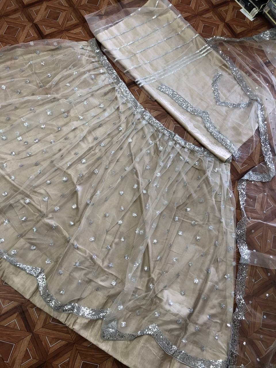 Appealing Off White Color Occasion Wear Net Embroidered Work Lehenga Choli