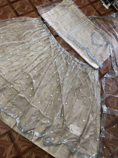 Appealing Off White Color Occasion Wear Net Embroidered Work Lehenga Choli