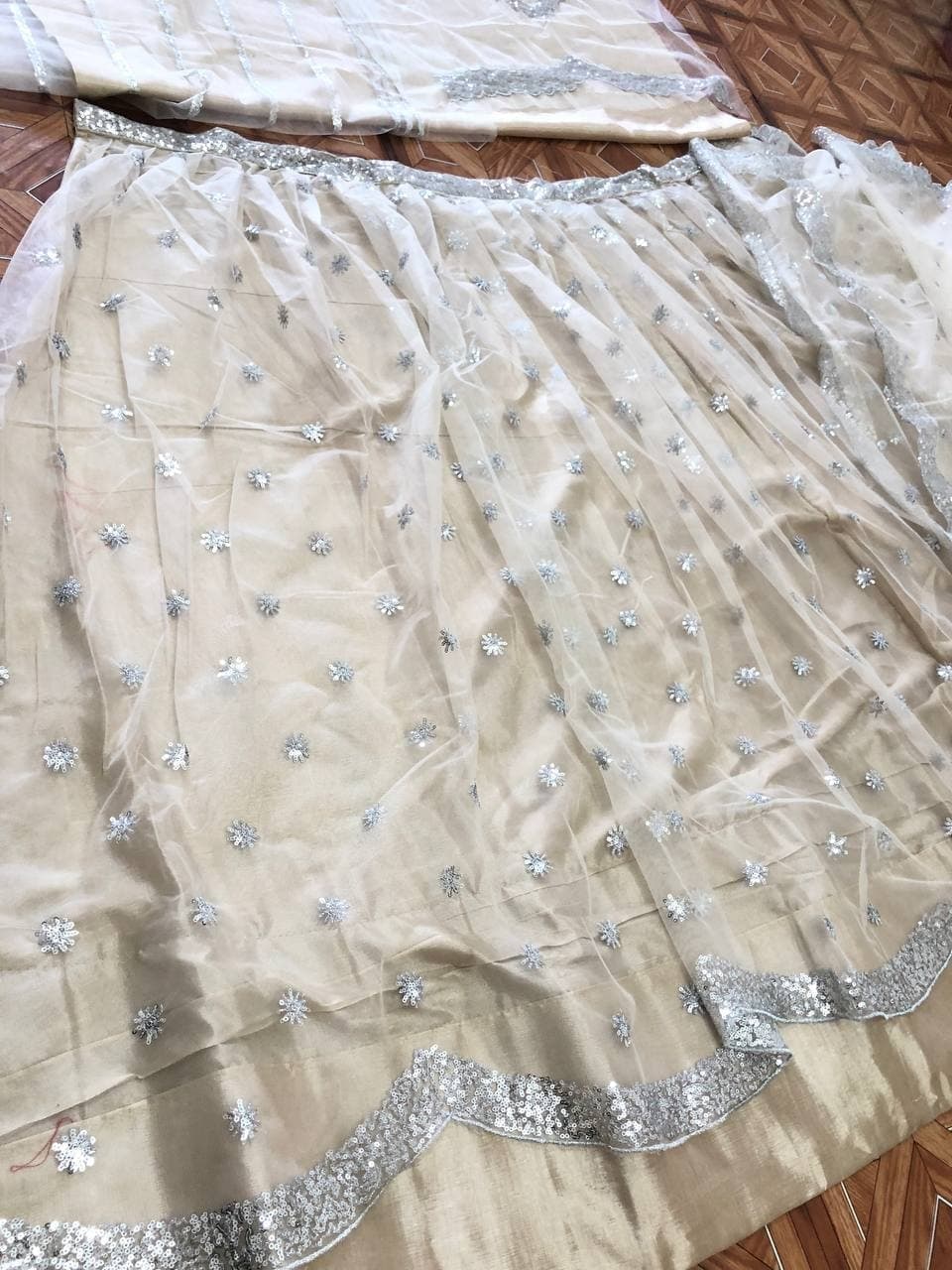 Appealing Off White Color Occasion Wear Net Embroidered Work Lehenga Choli