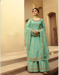 Glamrous Sea Green Color Festival Wear Dola Jacquard Silk Multi Thread Stone Embroidered Work Salwar Suit