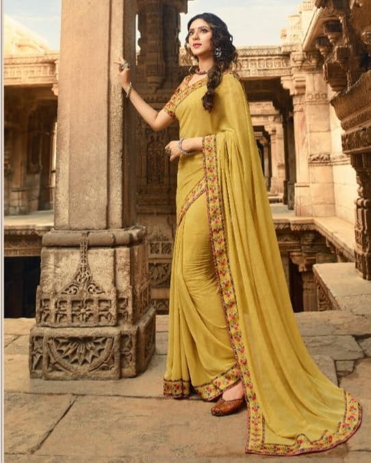 Shattering Mustard Color Festive Wear Georgette Designer Printed Border Saree Blouse