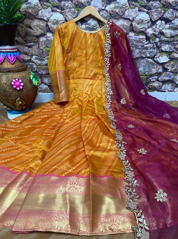 Bewildering Mustard Color Occasion Wear Banarasi Silk Design Zari Weaving Work Gown Dupatta