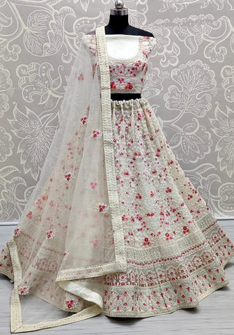 Demanding Off White Color Bridal Wear Embroidered Thread Multi Diamond Work Soft Net Lehenga Choli