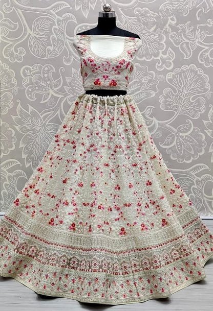 Demanding Off White Color Bridal Wear Embroidered Thread Multi Diamond Work Soft Net Lehenga Choli