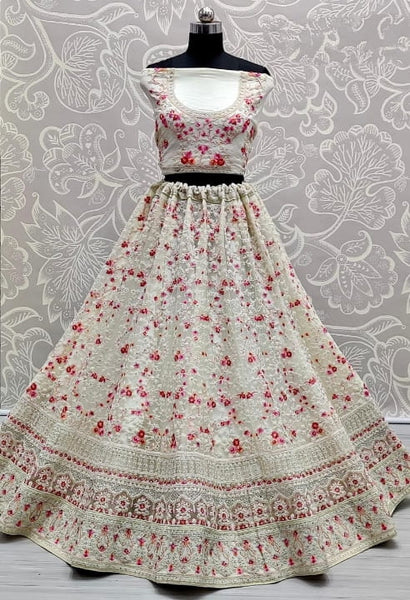 Demanding Off White Color Bridal Wear Embroidered Thread Multi Diamond Work Soft Net Lehenga Choli