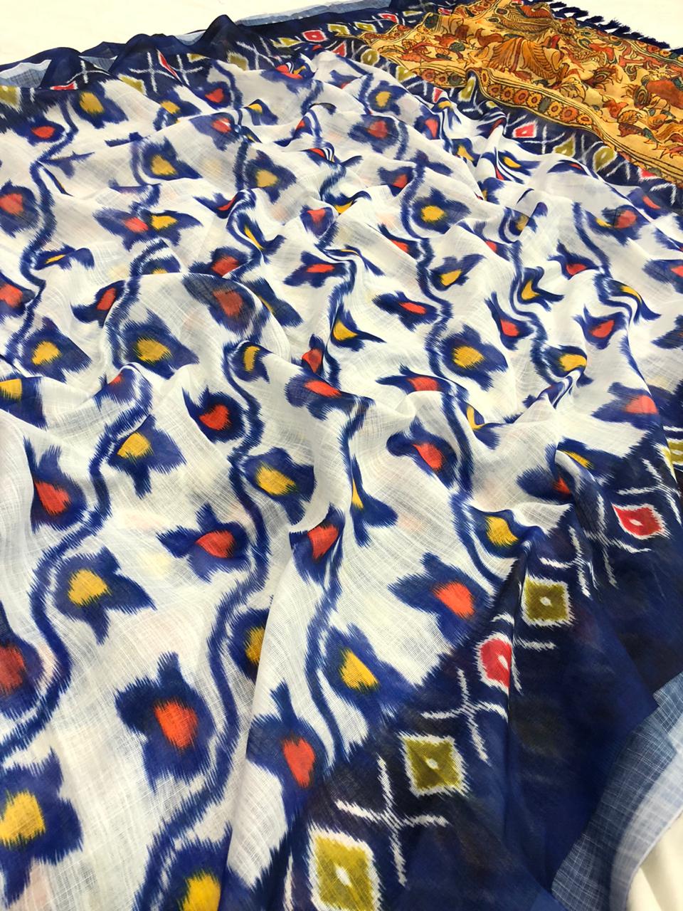 Hypnotic Multi Color Designer Soft Linen Ikkat Kalmkari Digital Printed Zari Border Designer Saree Blouse For Function Wear