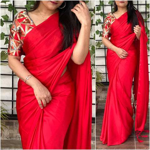 Captivation Red Color Japan Satin Tussles Pallu Saree Blouse