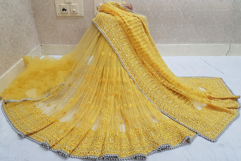 Remarkable Yellow Color Fancy LCD Stone Embroidered Steel Hand Pandadi Jarkhan Work Net Designer Saree Blouse For Wedding Wear