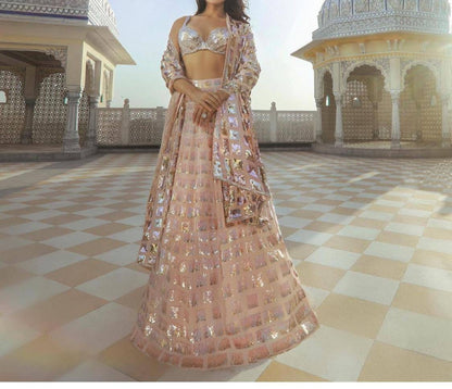Alluring Peach Color Wedding Wear Sequence Work Georgette Lehenga Choli