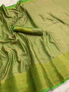 Knockout Green Color Party Wear Silk Banarasi All Over Zari Woven Border Saree Blouse