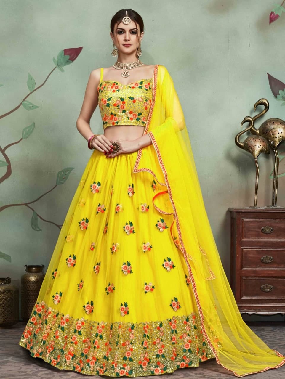 Bewildering Yellow Color Net Embroidered Designer Work Festive Wear Lehenga Choli