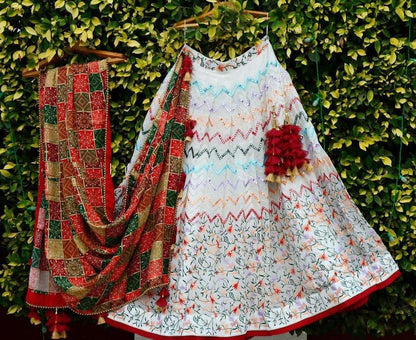 Sensational White Color Festive Wear Silk Embroidered Mirror Work Lehenga Choli
