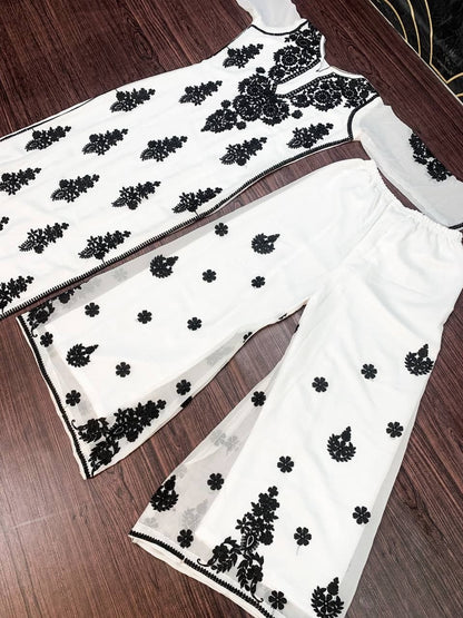 Dismaying White Color Regular Wear Georgette Chine Stitched Work Plazo Kurti