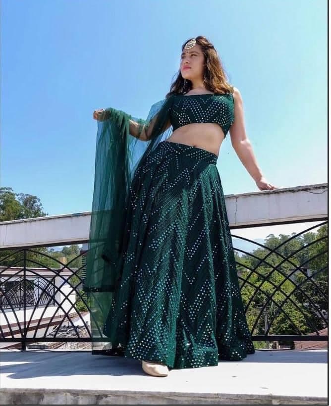 Hypnotic Bottle Green Color Occasion Wear Sequence Work Georgette Lehenga Choli