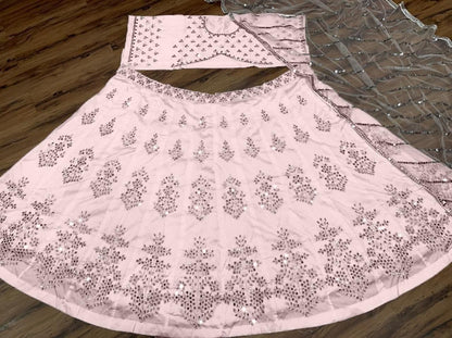 Outstanding Peach Color Tapeta Mirror Work Wedding Wear Lehenga Choli