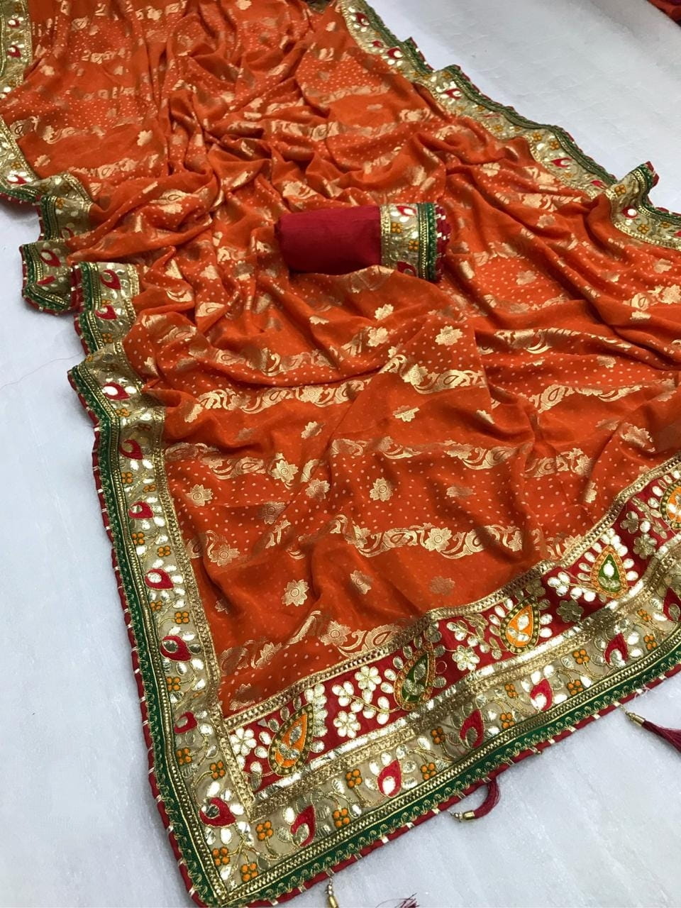 Festive Wear Dark Orange Color Soft Georgette Bandhej Printed Mill Foil Work Designer Saree Blouse