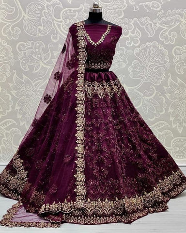 Pleasant Wine Color Function Wear Net Thread Embroidered Work Lehenga Choli