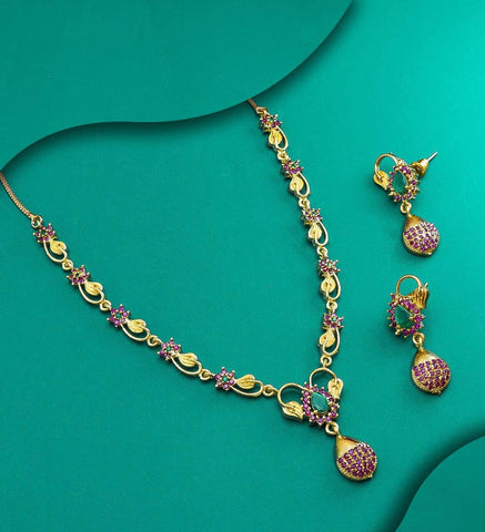 Stupendous Wine Color Diamond American Design Golden Wedding Wear Necklace Set