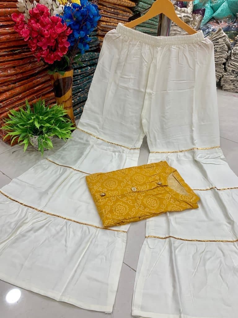 Novelty Yellow Color Full Stitched Bandhani Printed Rayon Design Kurti Plazo