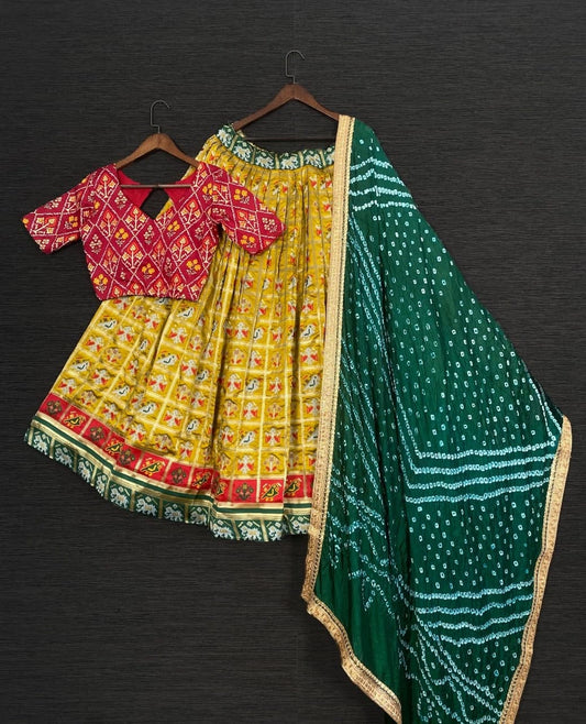 Shattering Yellow Color Patola Occasion Wear Jacquard Work Fancy Lehnega Choli