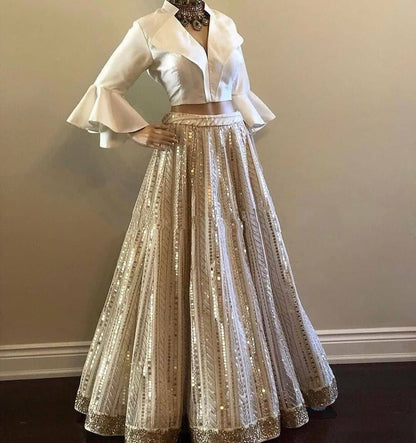Bewildering Cream Color Taffeta Silk Sequence Work Lehenga Choli