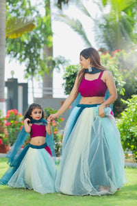 Magnetic Blue Color Net Wedding Wear Mother Daughter Lehnega Choli