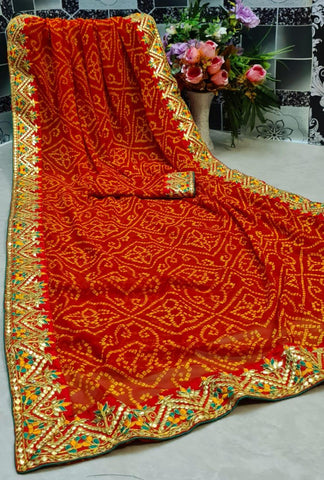 Party Wear Orange Color Bhandhej Gotta Patti Lace Border Printed Soft Georgette Designer Saree Blouse