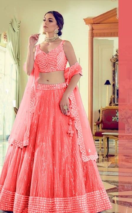 Impressive Peach Color Net Silk Mirror Work Lehenga For Women